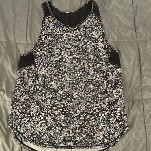 Black with purple floral lululemon tank with mesh size 6